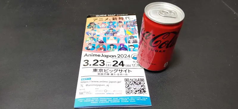 アニメジャパン2024でもらえる会場マップとコカ・コーラの写真