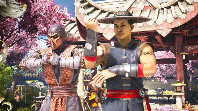 少林拳で構えるクン・ラオとトレマー 背景は桜と寺